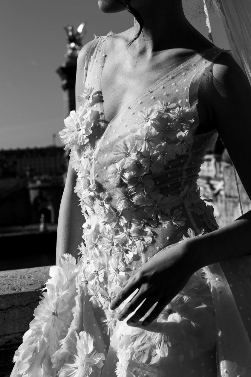 lose-up of a couture wedding dress in black and white, fine art fashion detail by Olivier Neuville.